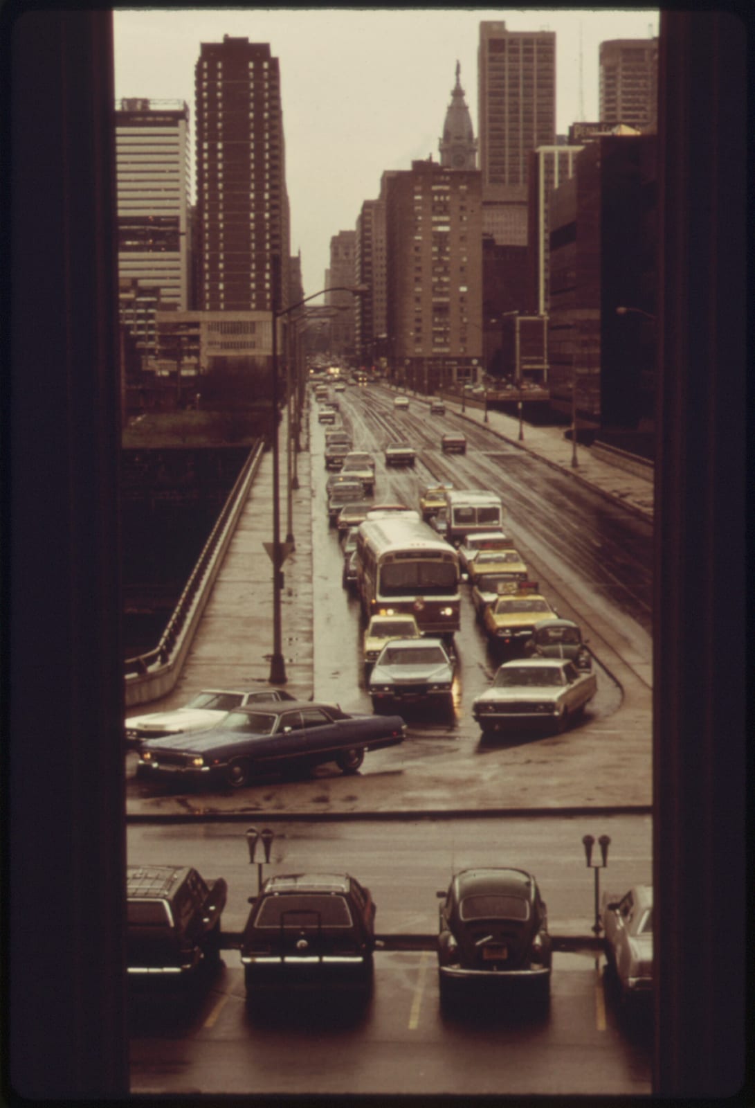 A PORTION OF DOWNTOWN PHILADELPHIA, PENNSYLVANIA, SEEN FROM THE 30TH STREET STATION. IT IS ONE OF FOUR OR FIVE STOPS MADE BY AMTRAK'S METROLINERS WHICH MAKE 16 ROUND TRIPS EACH DAY BETWEEN NEW YORK C…, 1974, Philadelphia